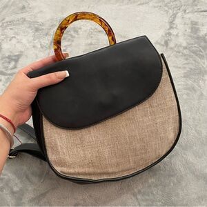 A new day faux leather backpack purse